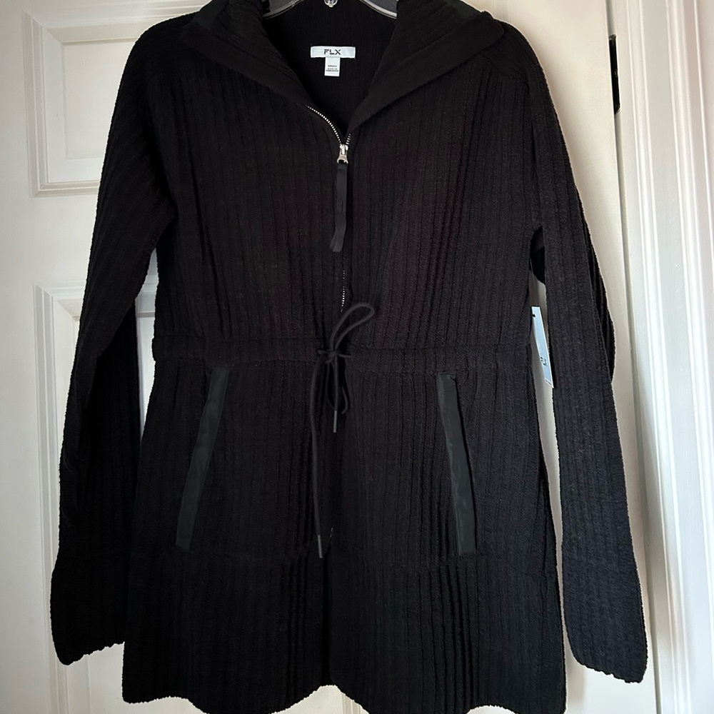 Black sweater jacket. New with tags. Size small.